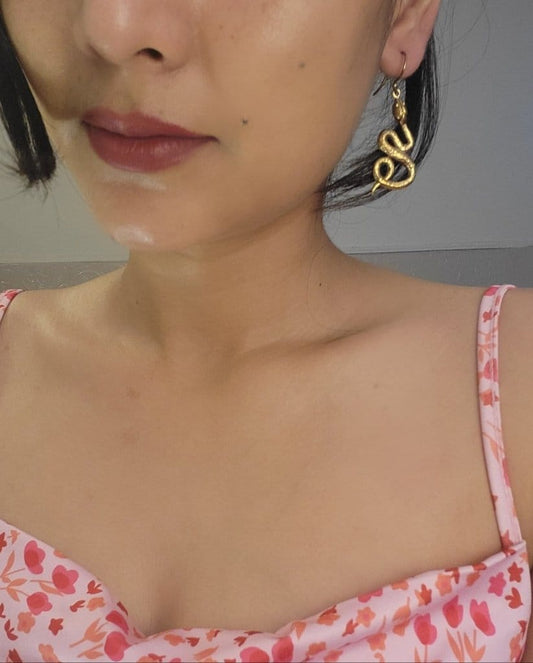 Naarya Jewels Interwined Snake Drop Brass Earrings (Anti Tarnish)