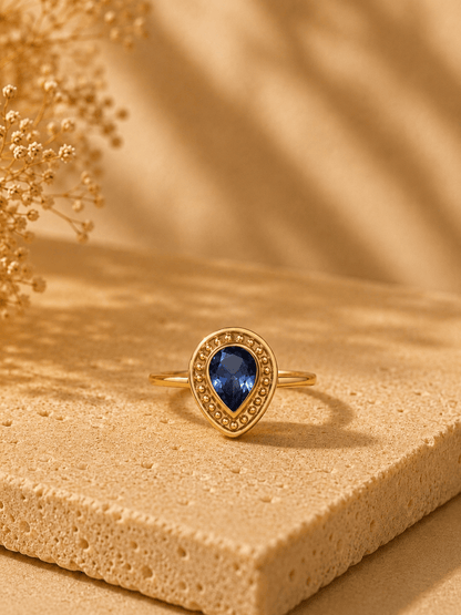 Naarya Jewels Tanzanite / 12 Pear-Cut  Beaded Halo Ring